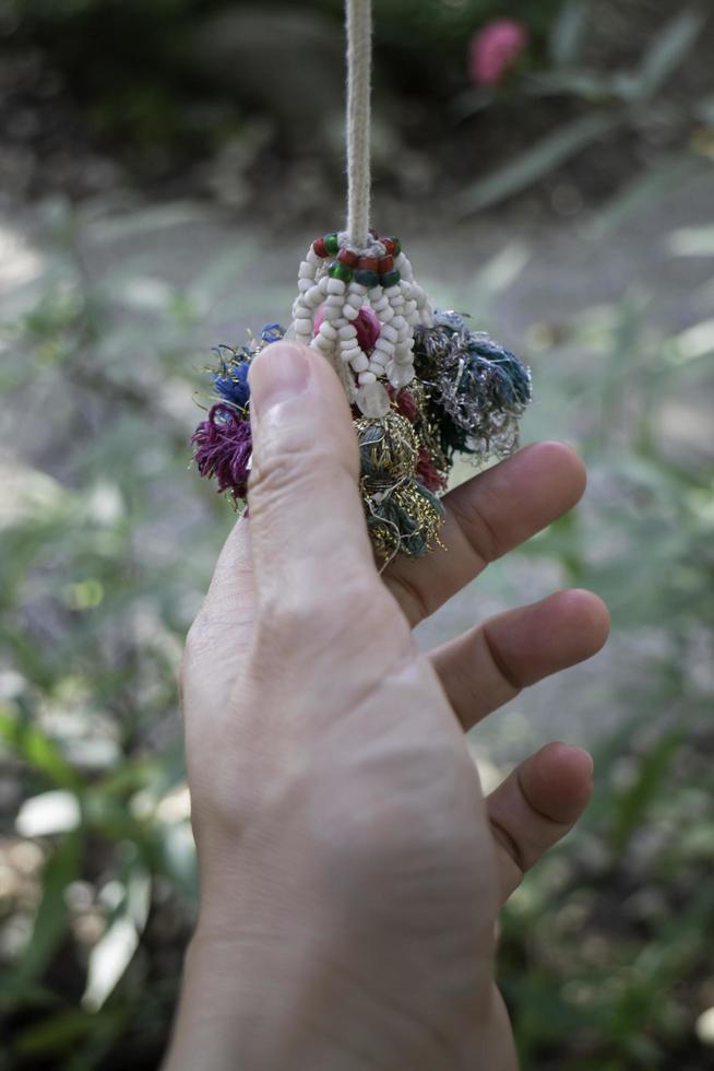 Hand holding an ornament photo