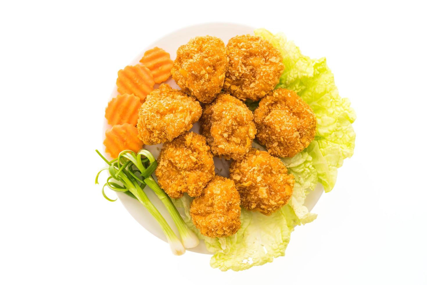 Fried shrimp or prawn cake on a white plate photo