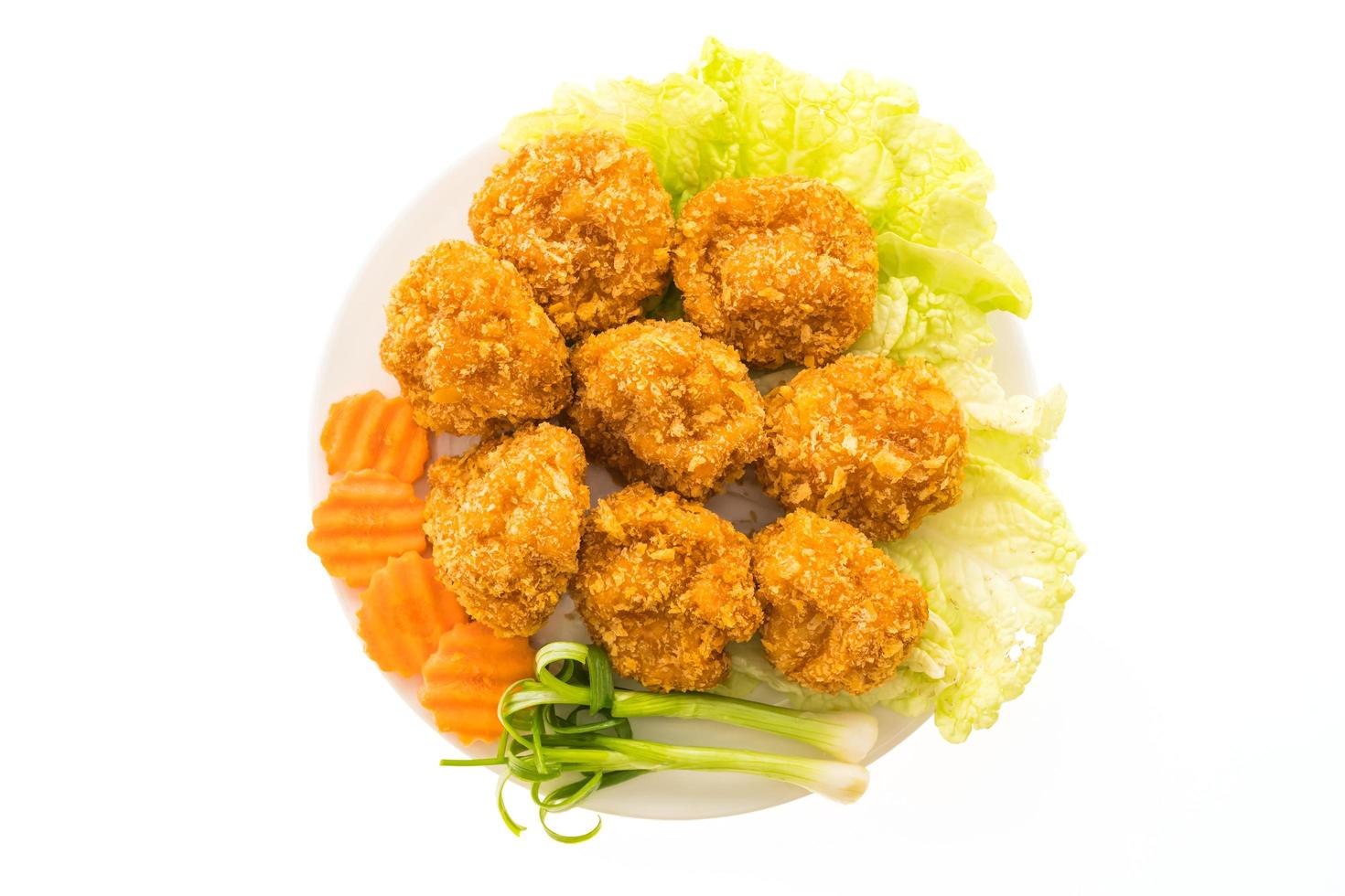 Fried shrimp or prawn cake on a white plate photo