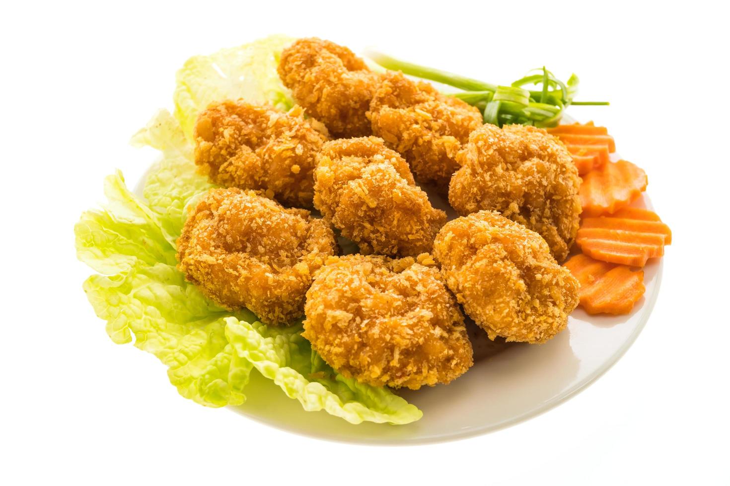 Fried shrimp or prawn cake on a white plate photo