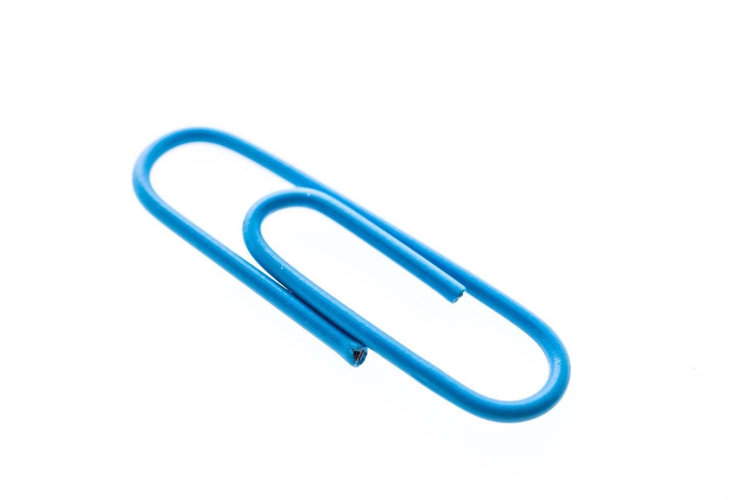 Paper clip on white background photo