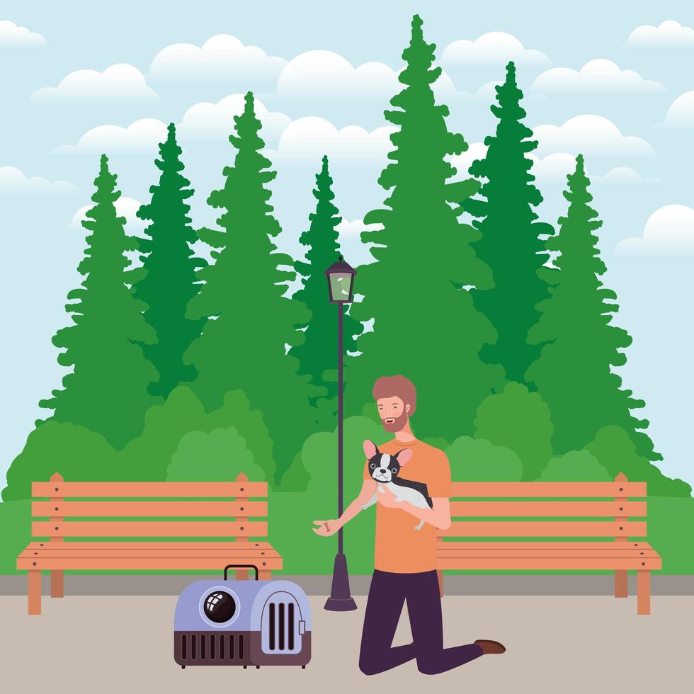 young man lifting cute dog mascot in the park vector