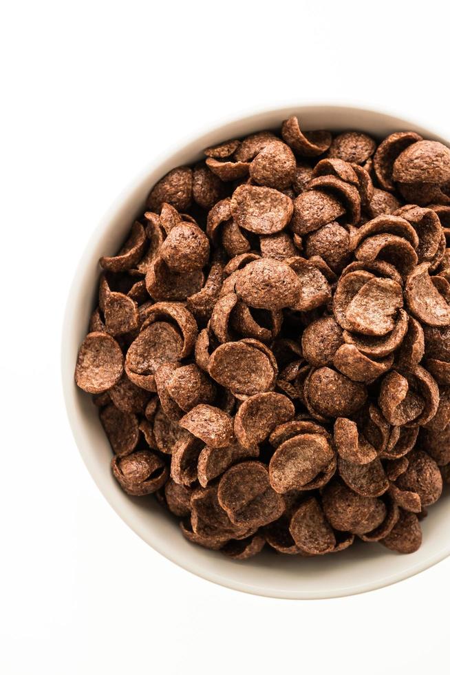 Chocolate cereals in white bowl photo