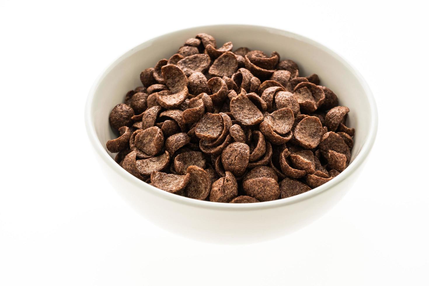 Chocolate cereals in white bowl photo