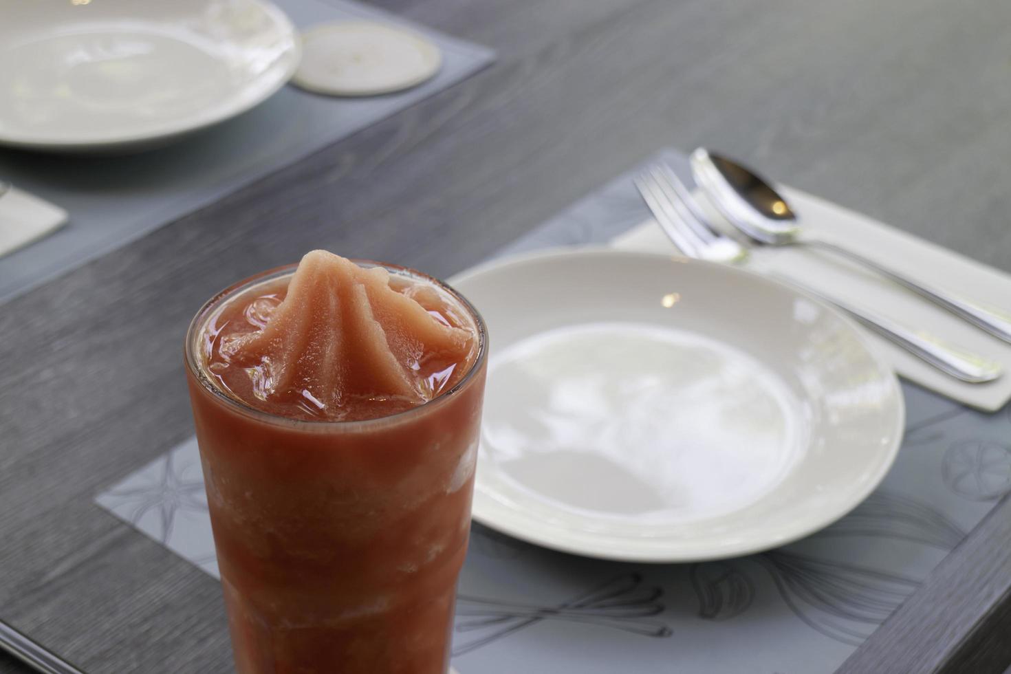Glass of watermelon smoothie photo