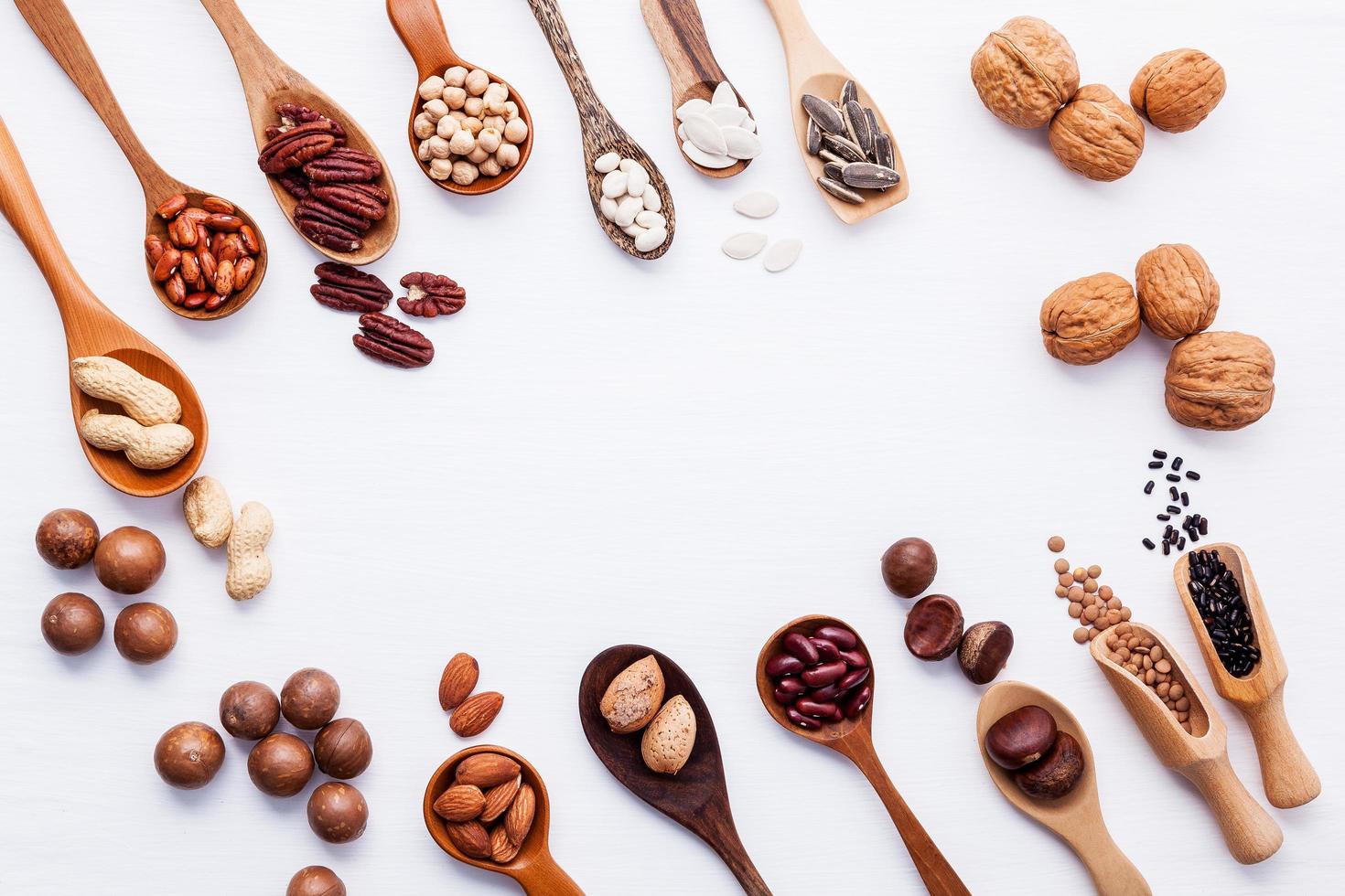 Spoons of legumes and nuts photo