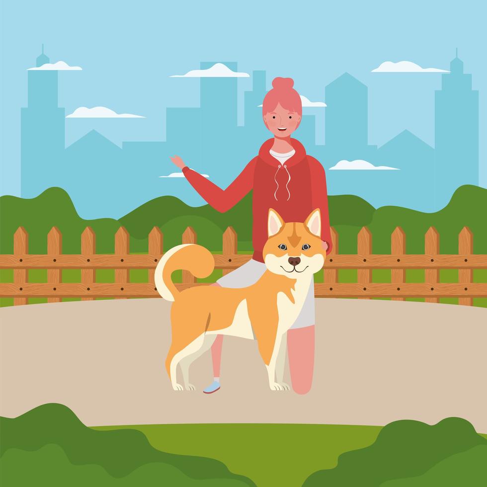 young woman with cute dog in the field vector