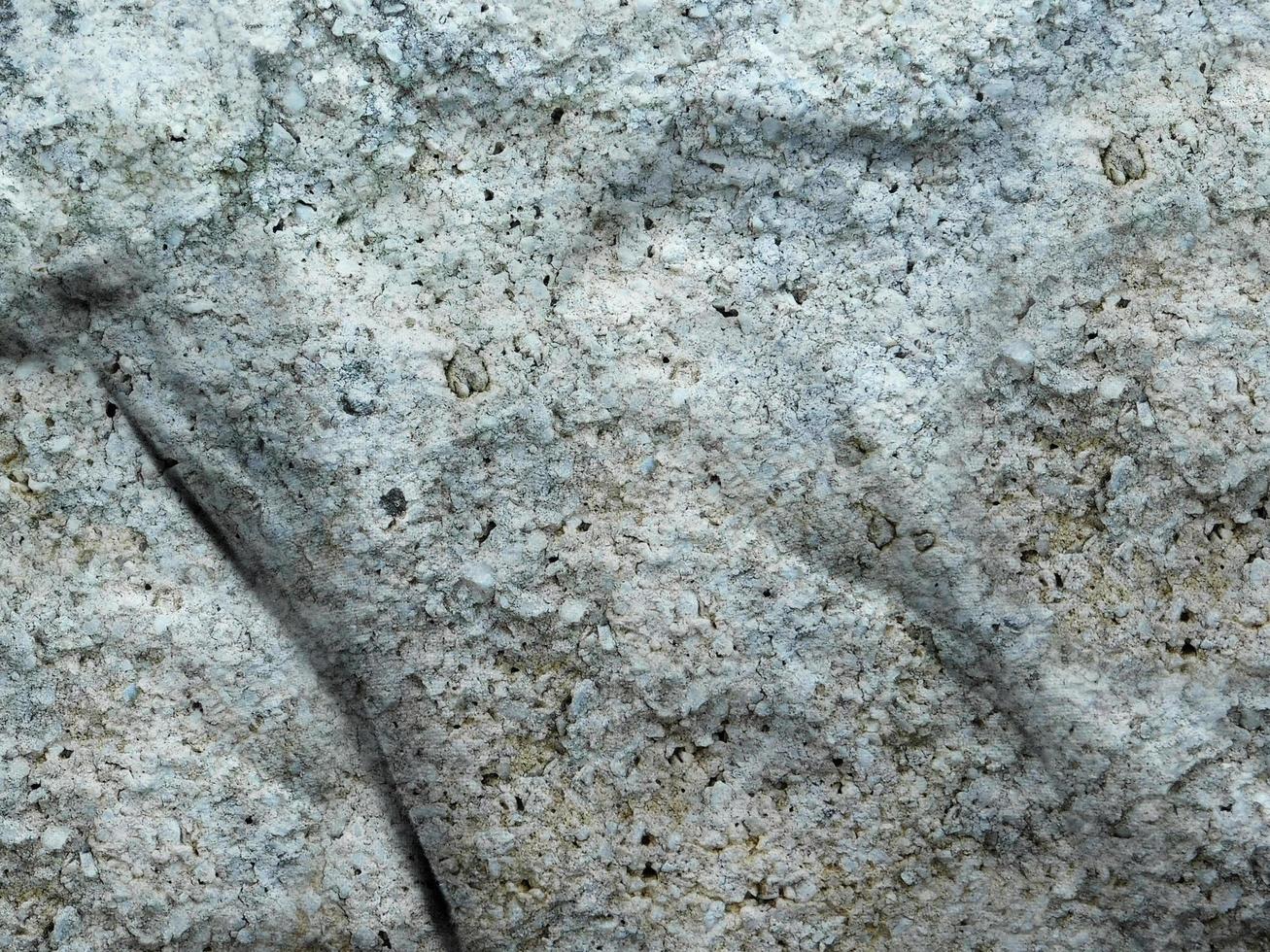 roca o muro de piedra para el fondo o la textura foto
