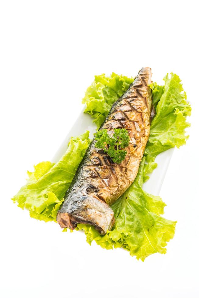 Grilled saba fish with sweet sauce on white plate photo