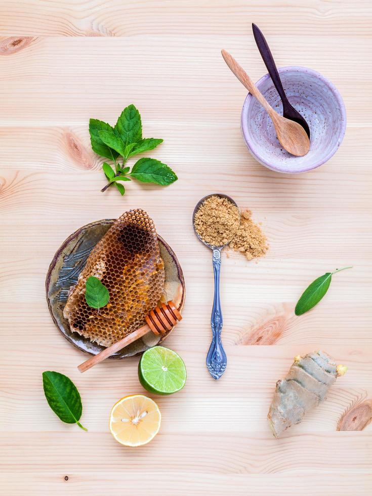 Top view of raw honey and ingredients photo