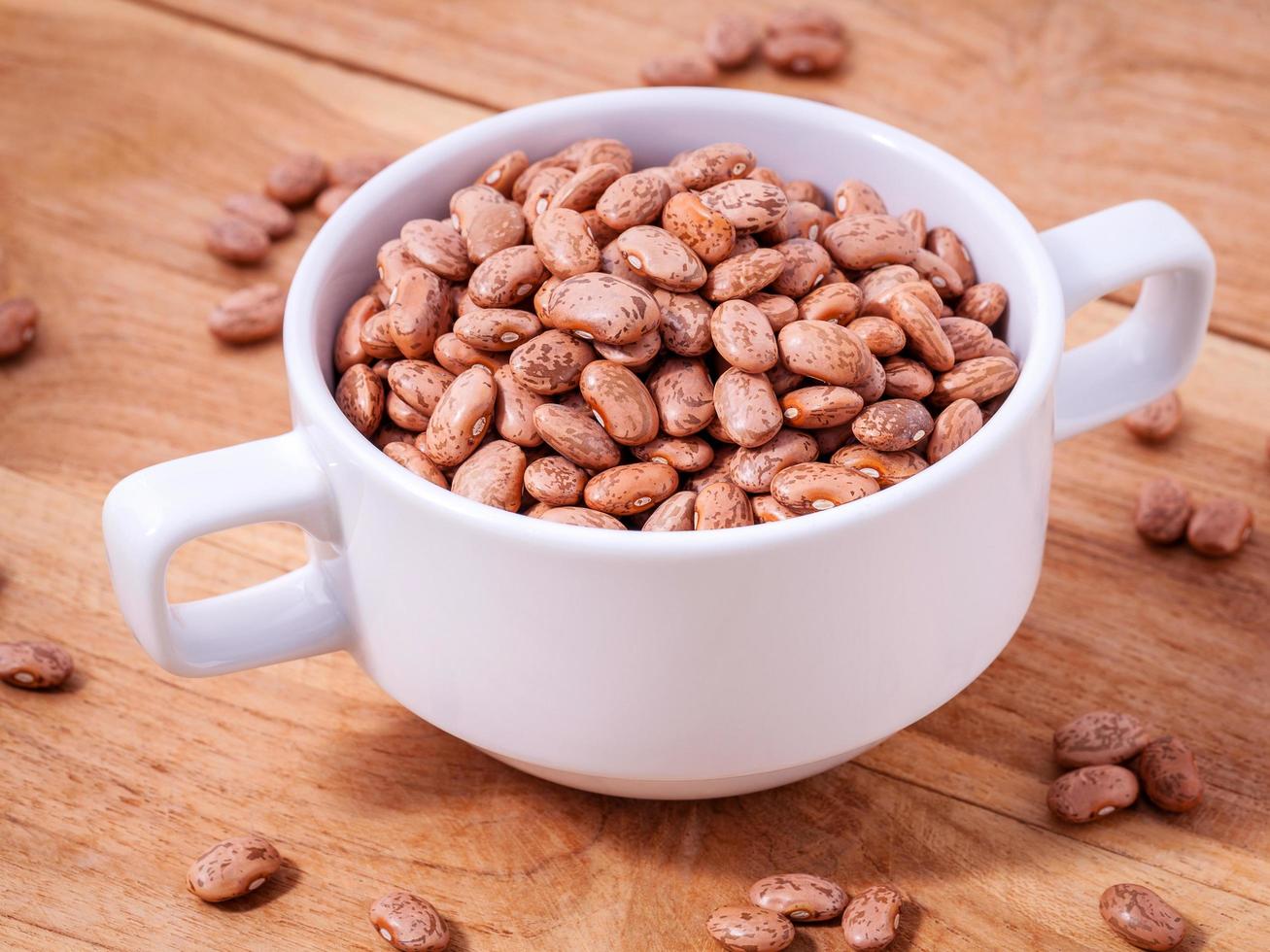 Pinto beans in a mug photo