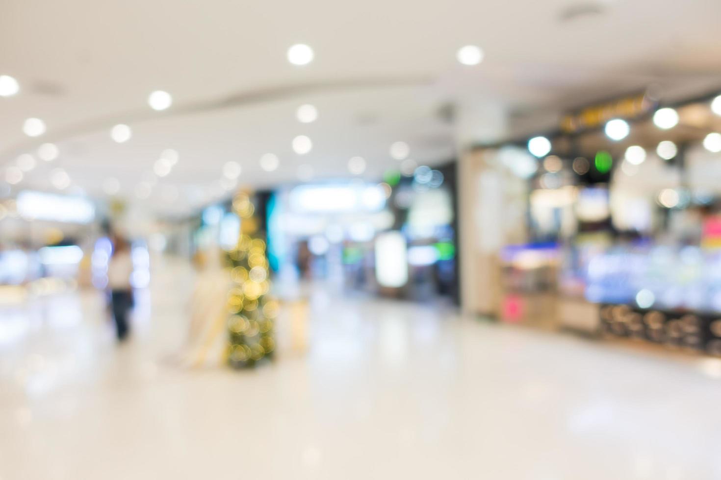 interior del centro comercial desenfocado foto