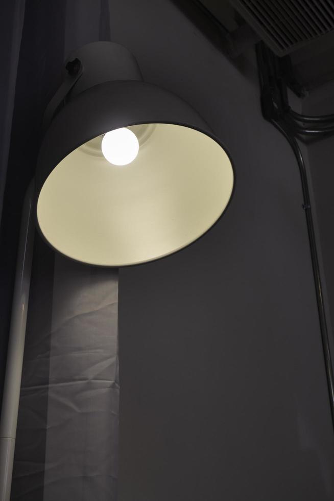 Lamp with bulb on photo