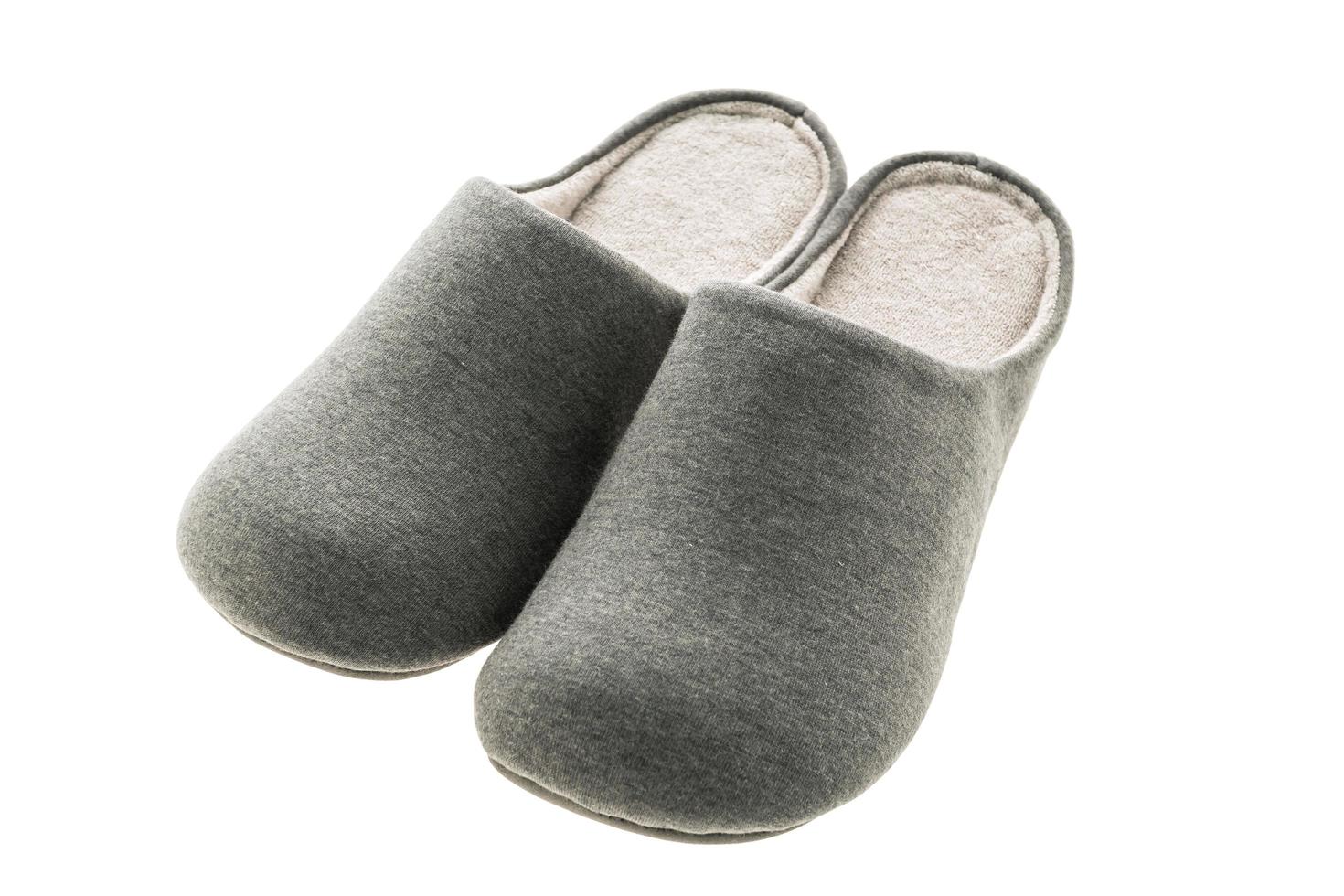 Grey Slippers on white background photo