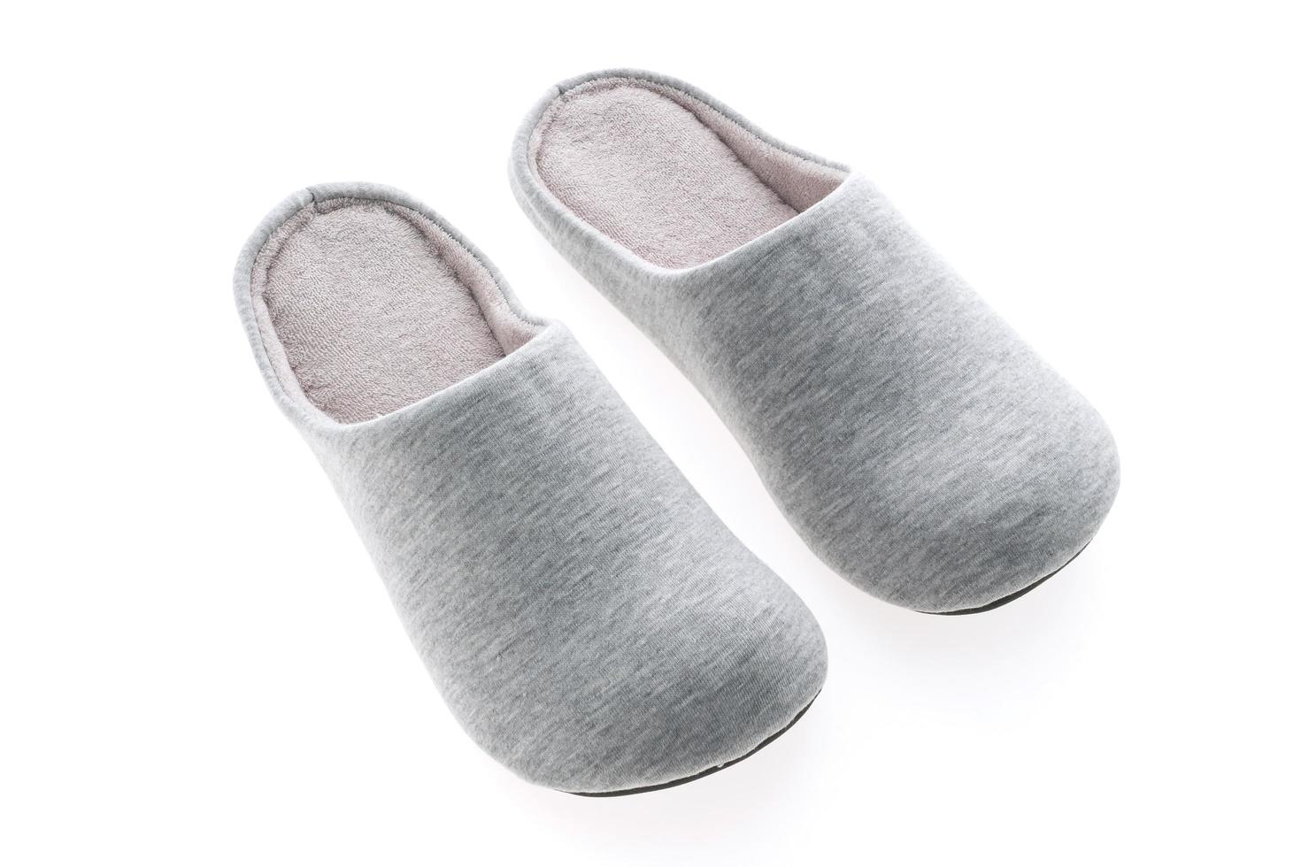 Grey Slippers on white background photo