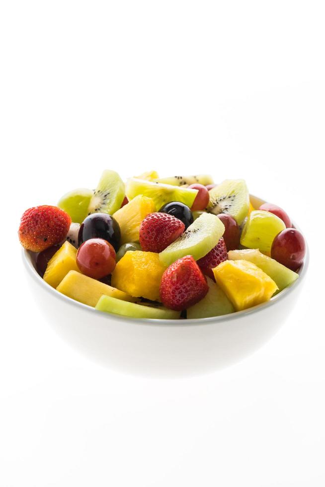 Mixed fruits on white plate photo