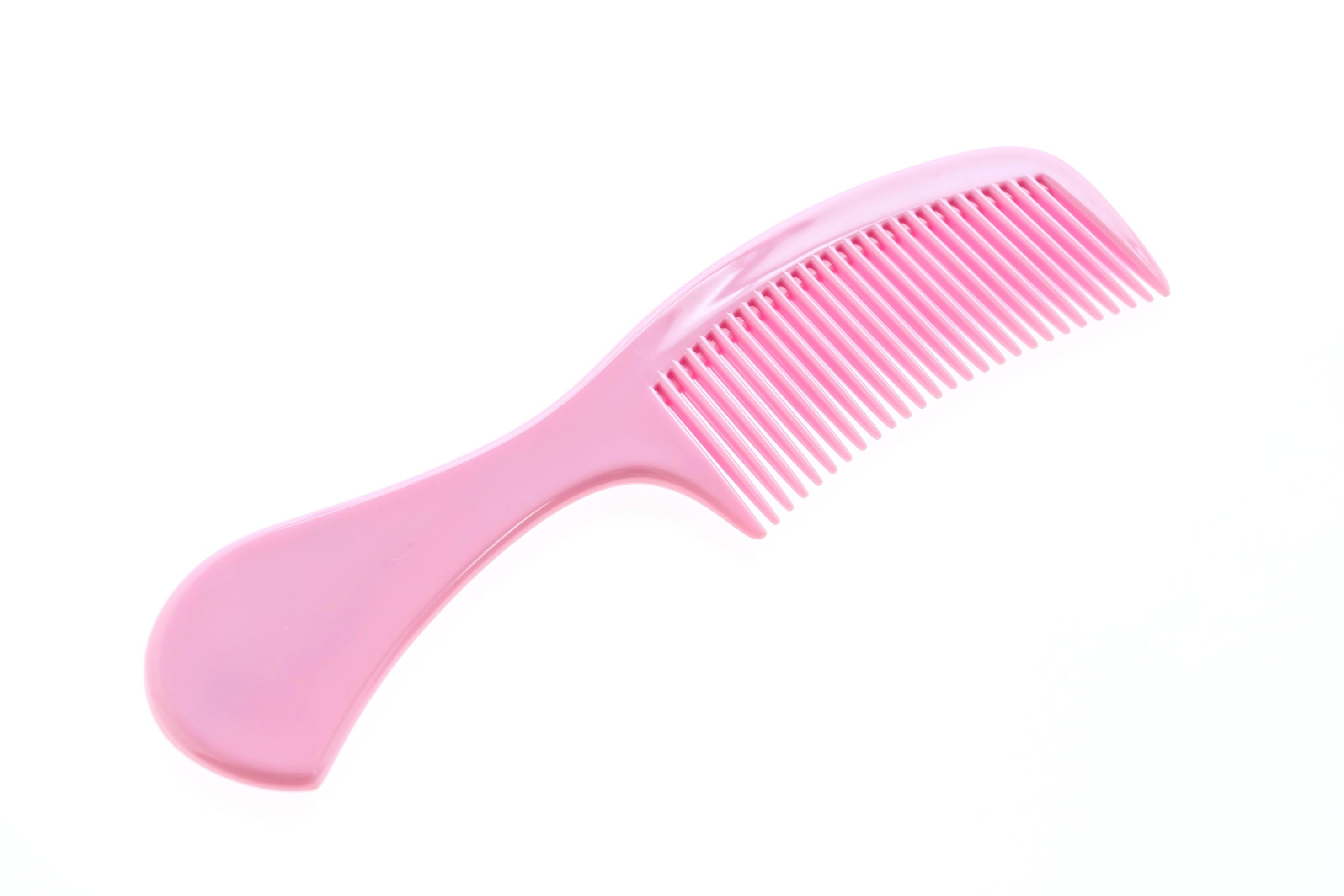 Plastic hair comb isolated on white background 2114987 Stock Photo at  Vecteezy
