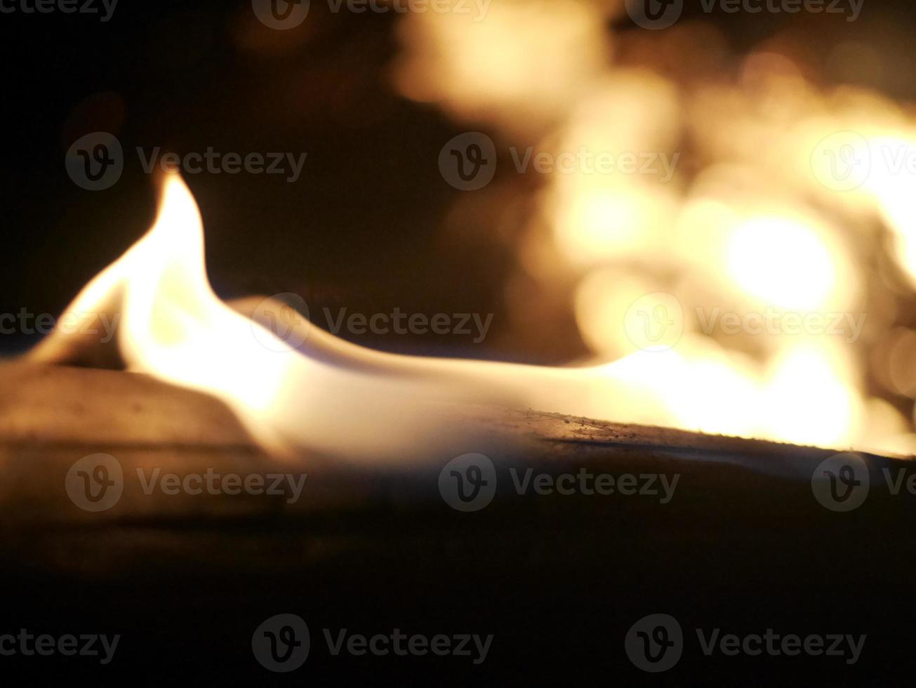 Close-up of flames on a log photo