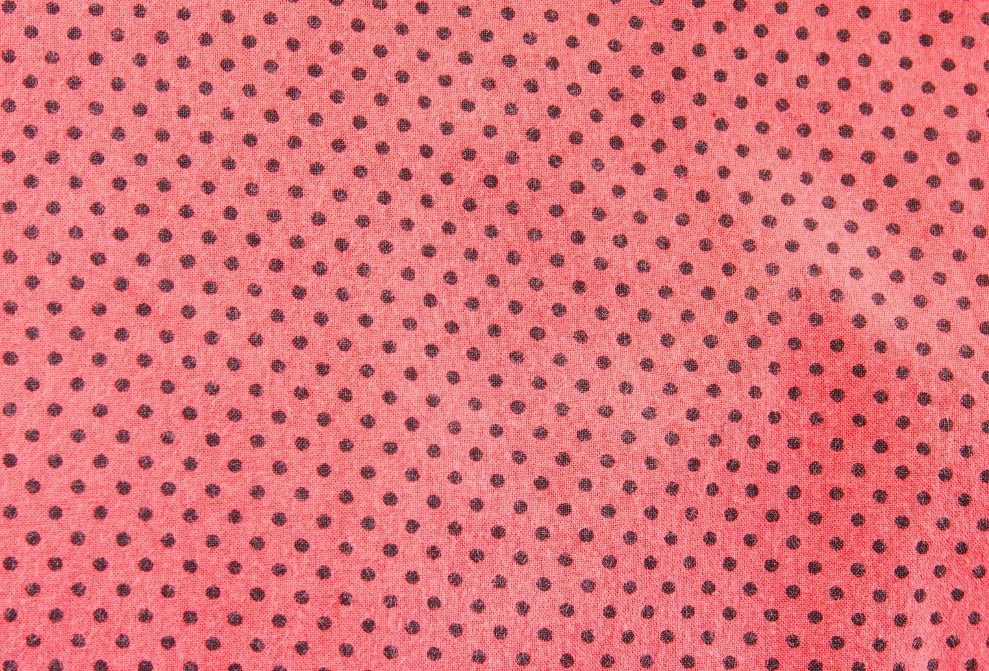 Red and black polka dot background photo