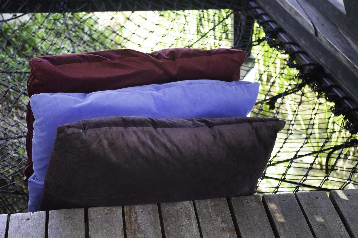 Colorful pillows on a hammock photo