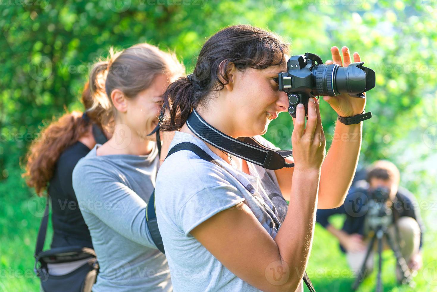 Participants in a photography course outdoors photo