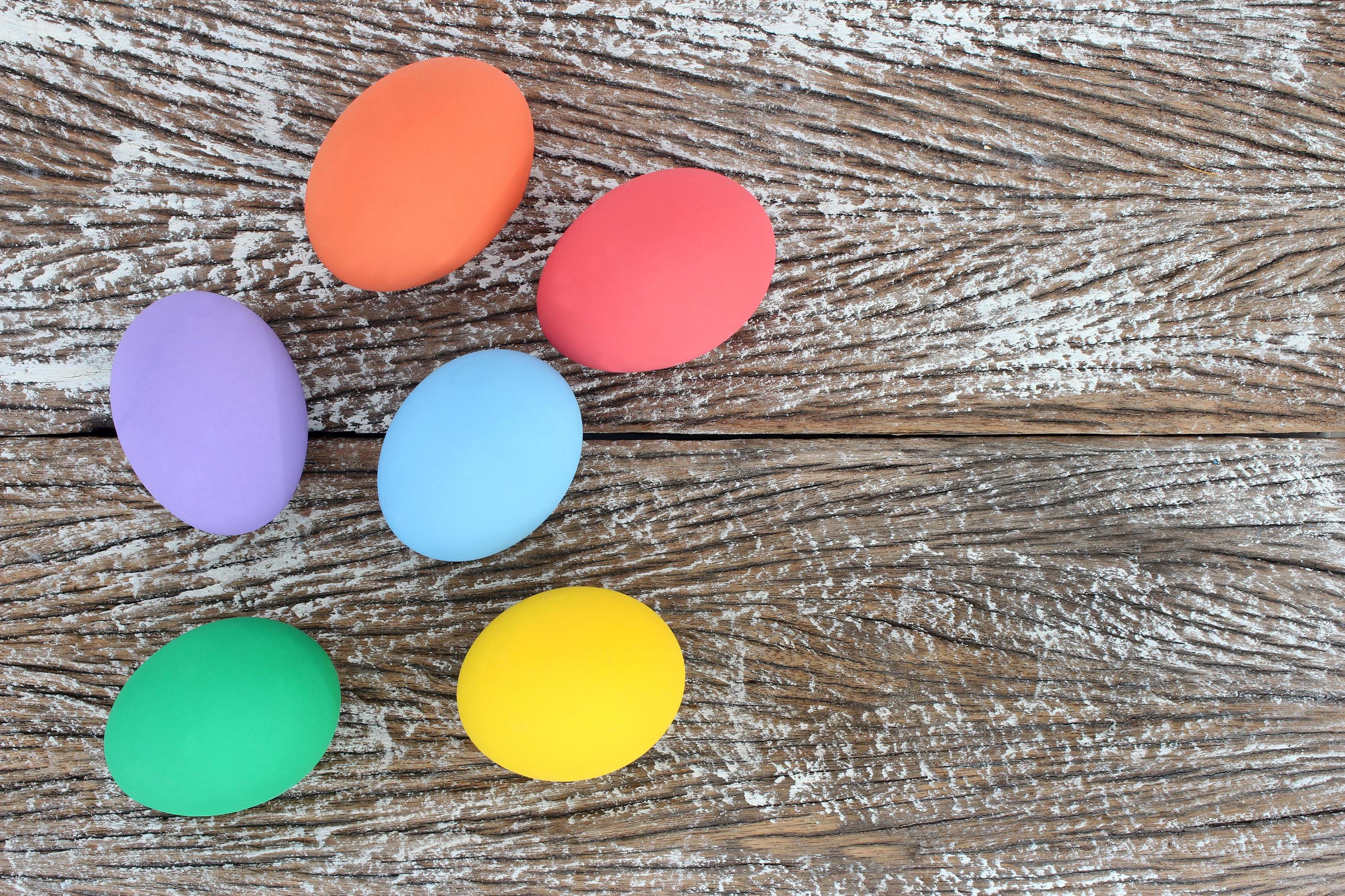 Easter eggs on a wooden background photo
