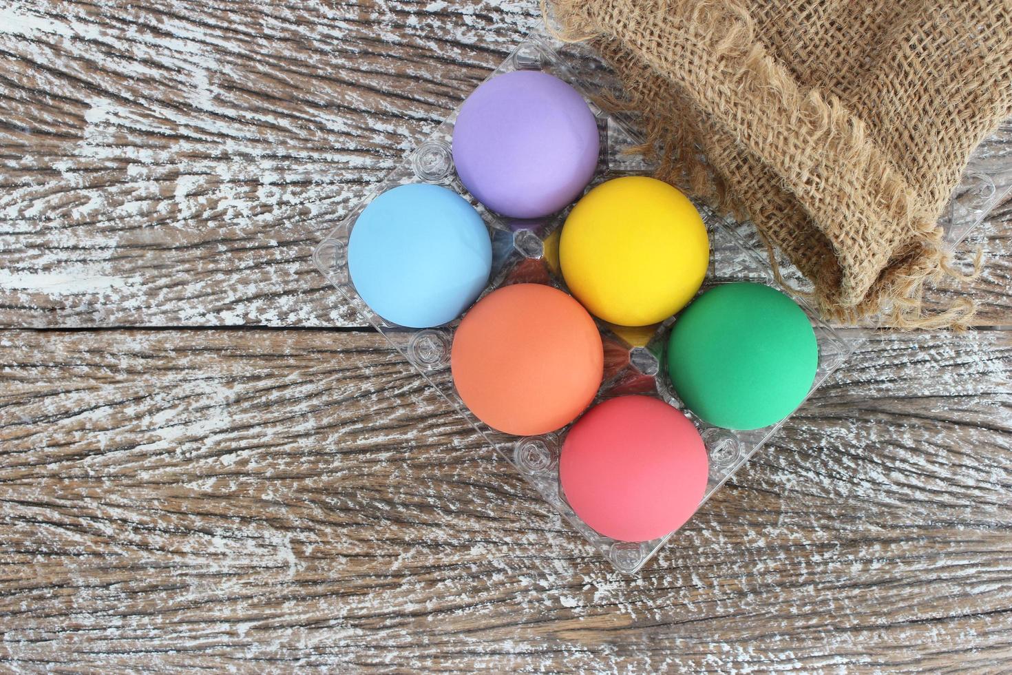 Easter eggs on a wooden background photo