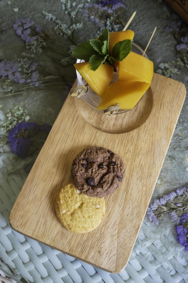 Mango and cookies snack photo