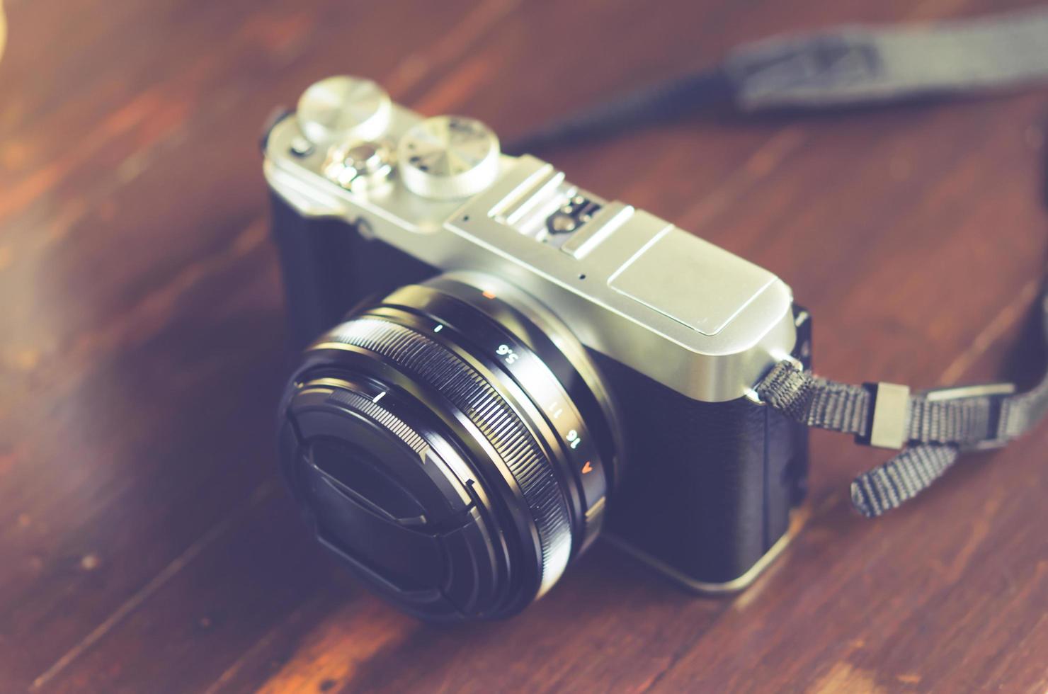 Vintage camera on a table photo