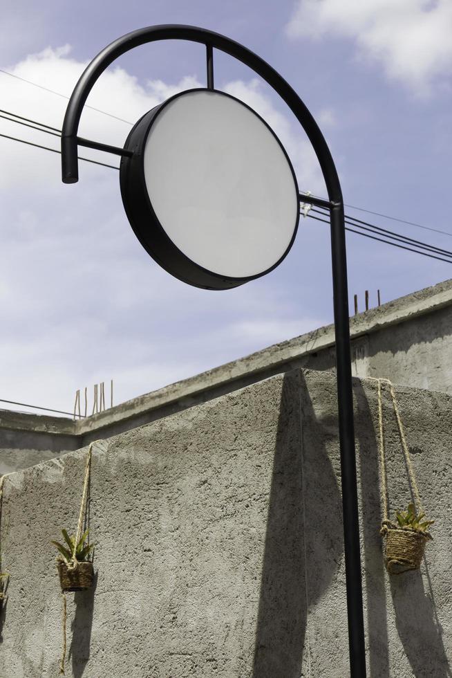 Outdoor shop with blank sign photo