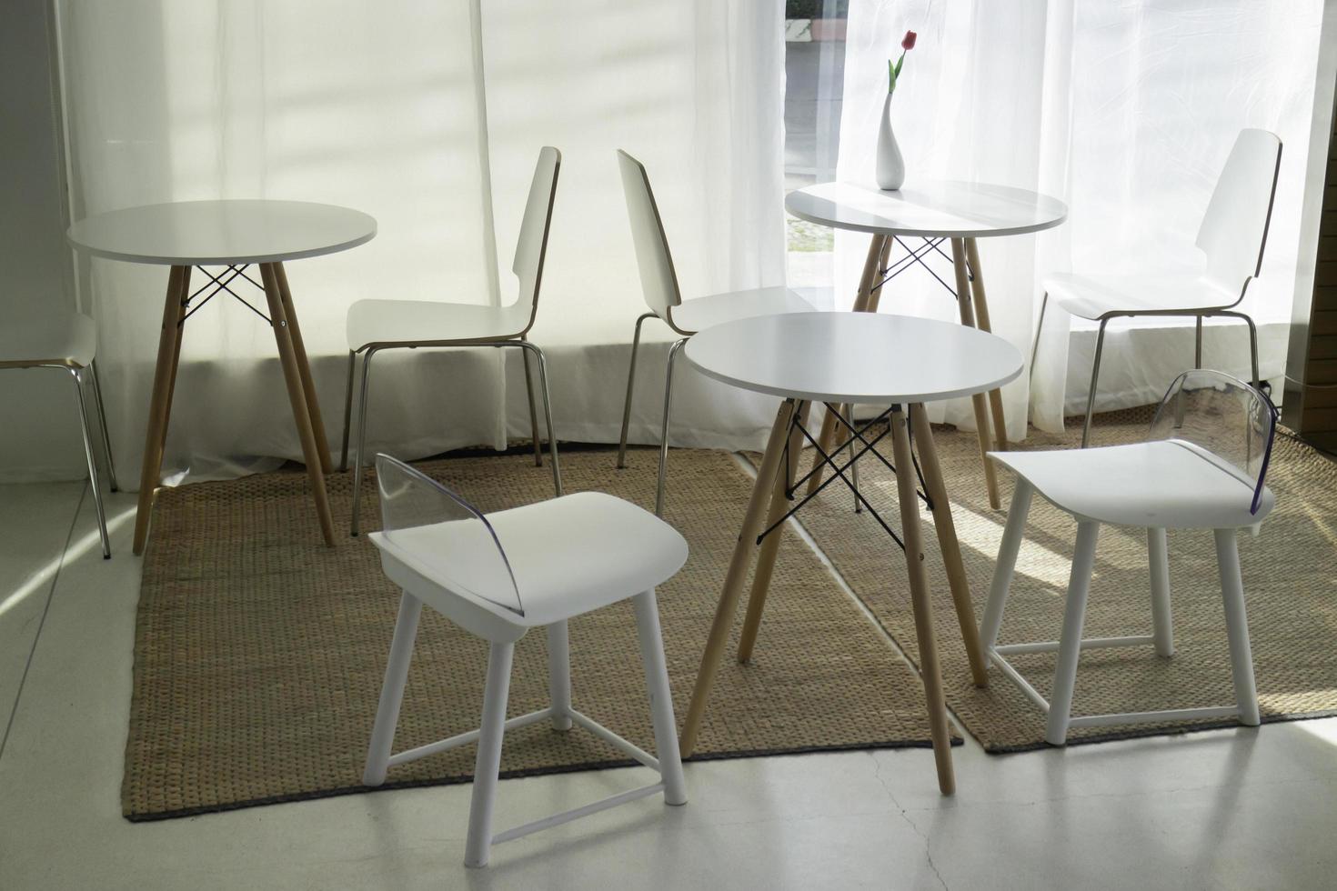 Tables and seats in co-working space photo