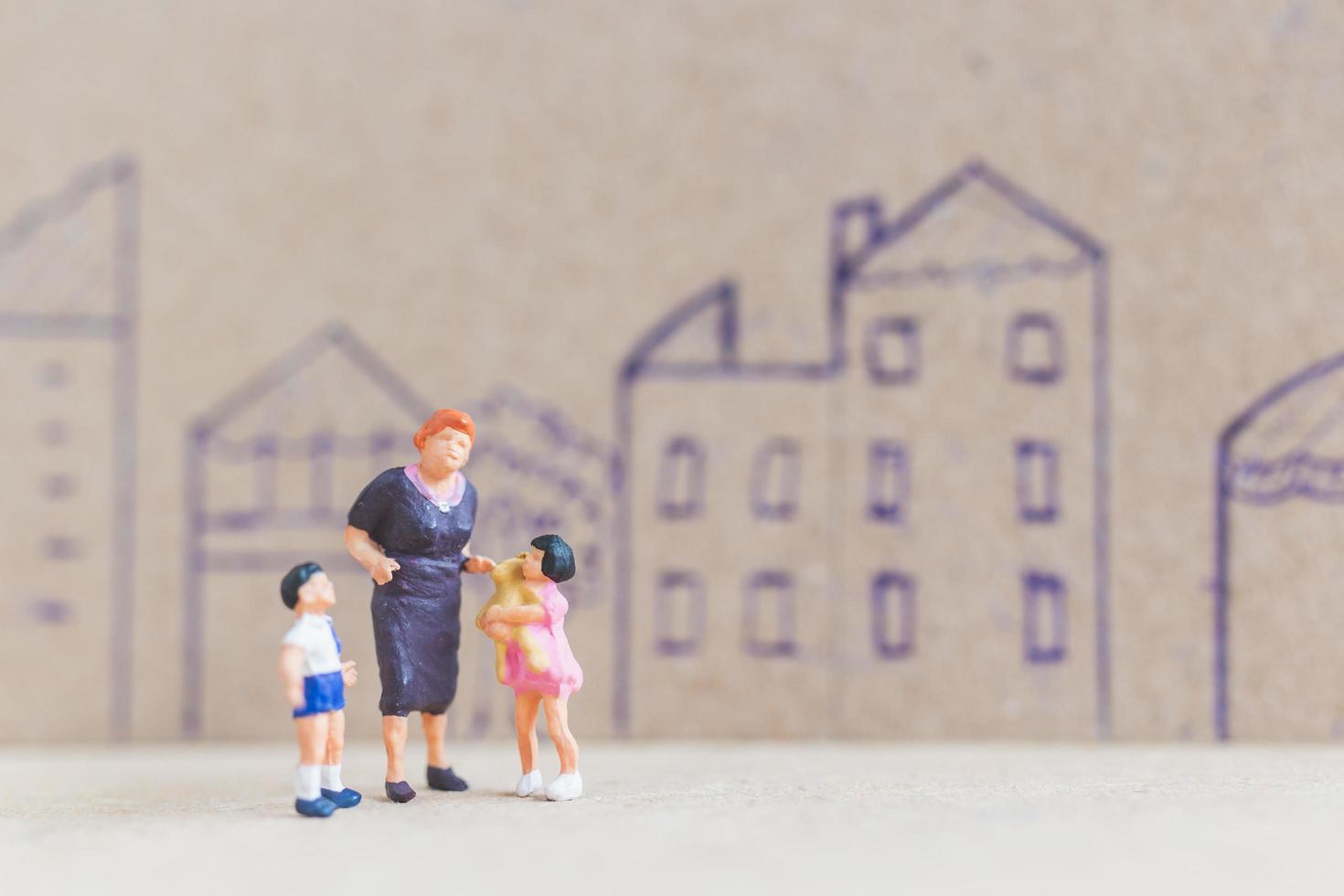 Miniature people staying at home doing self-quarantine to avoid coronavirus, stay home concept photo