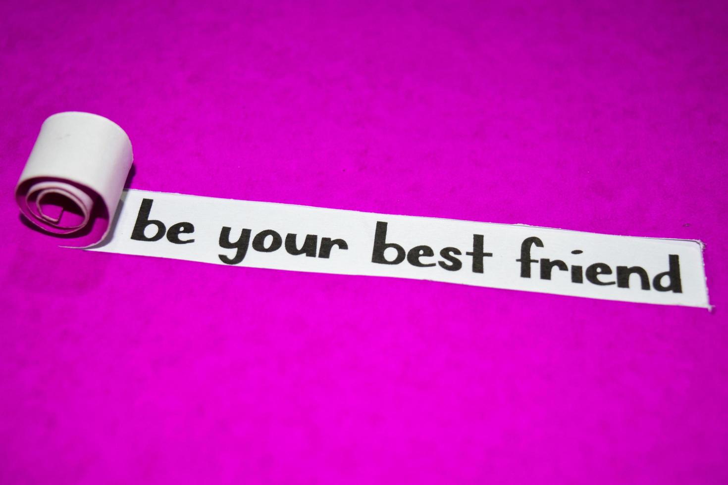 Be your best friend text, Inspiration, Motivation and business concept on purple torn paper photo