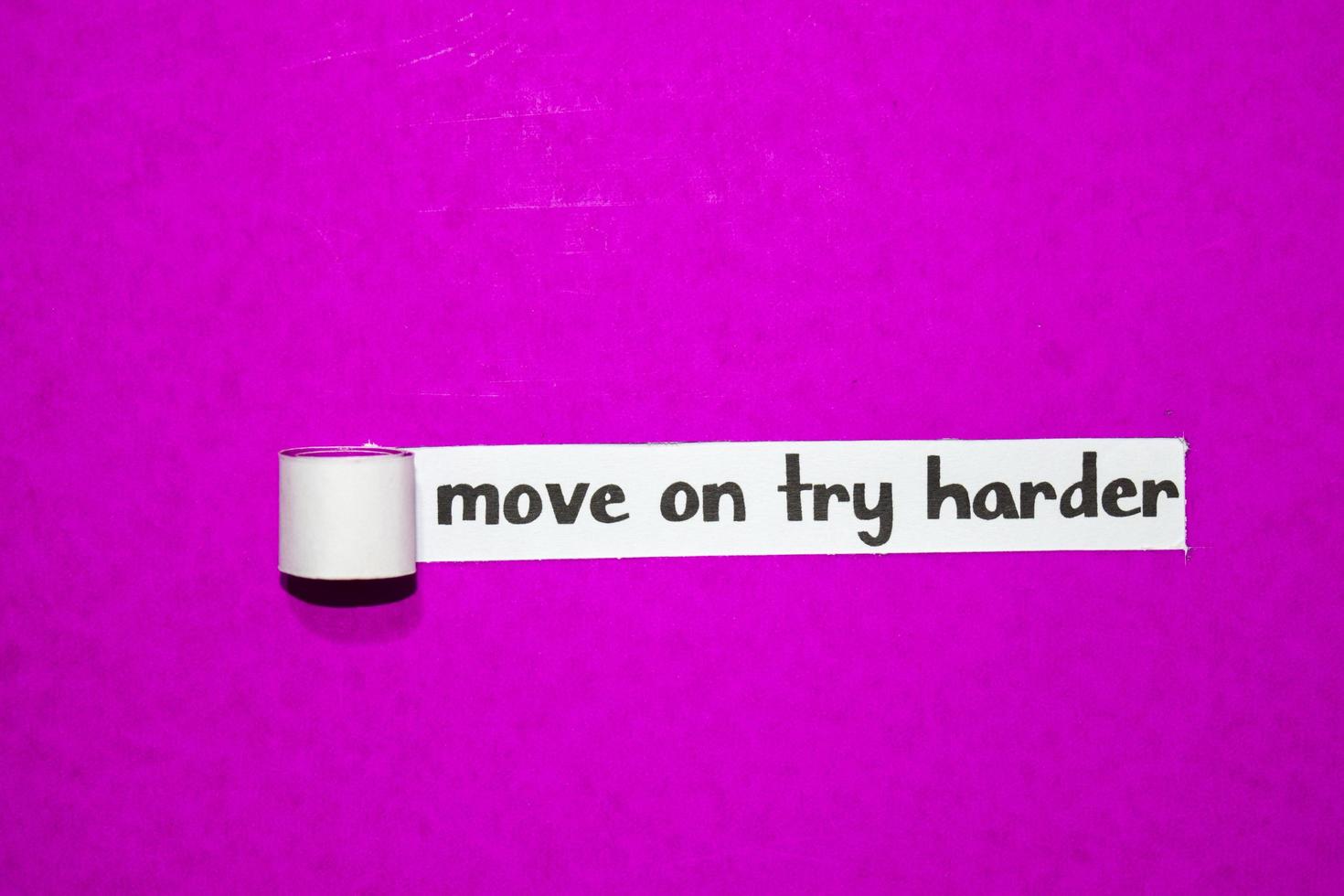 Move on try harder text, Inspiration, Motivation and business concept on purple torn paper photo