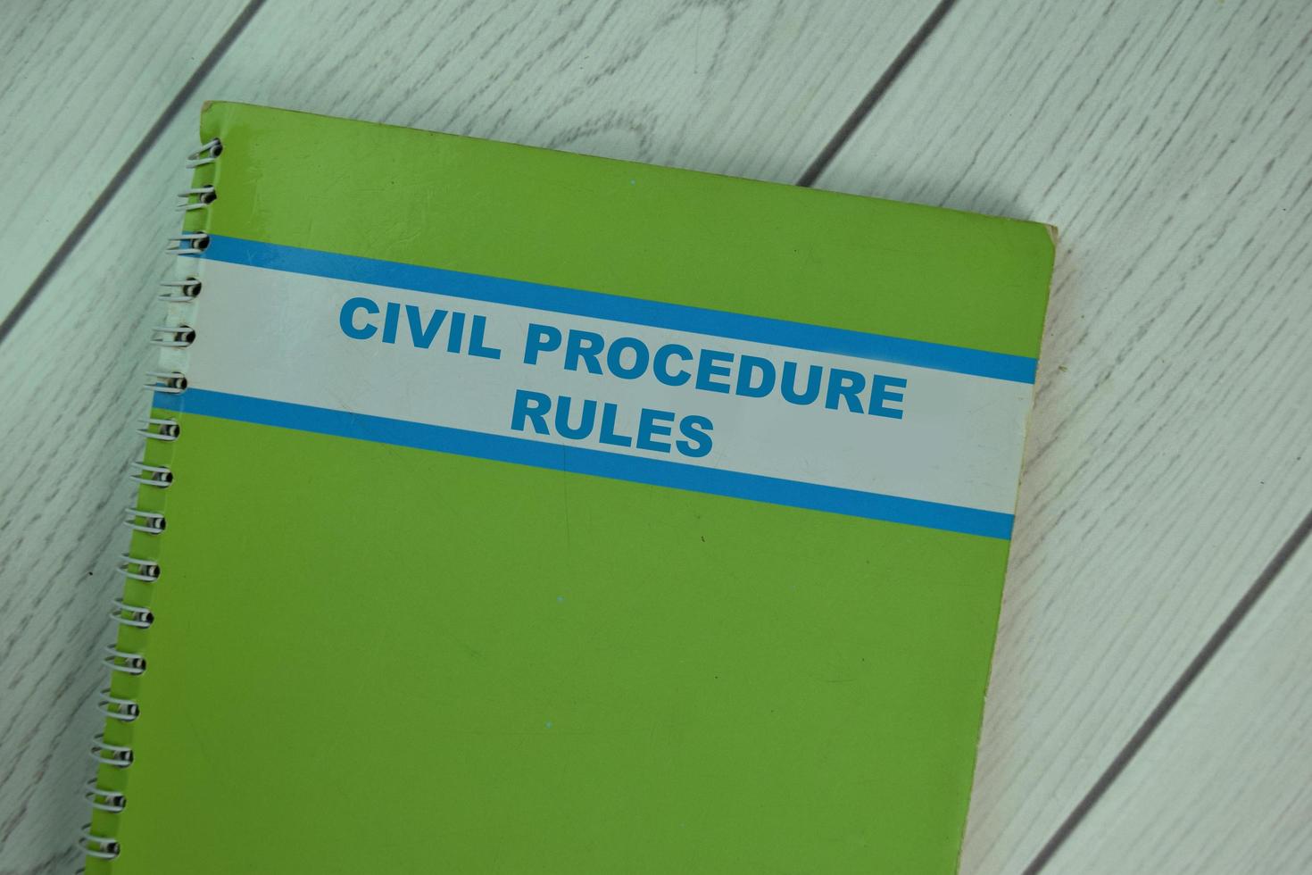 Book of Civil Procedure Rules isolated on wooden table photo