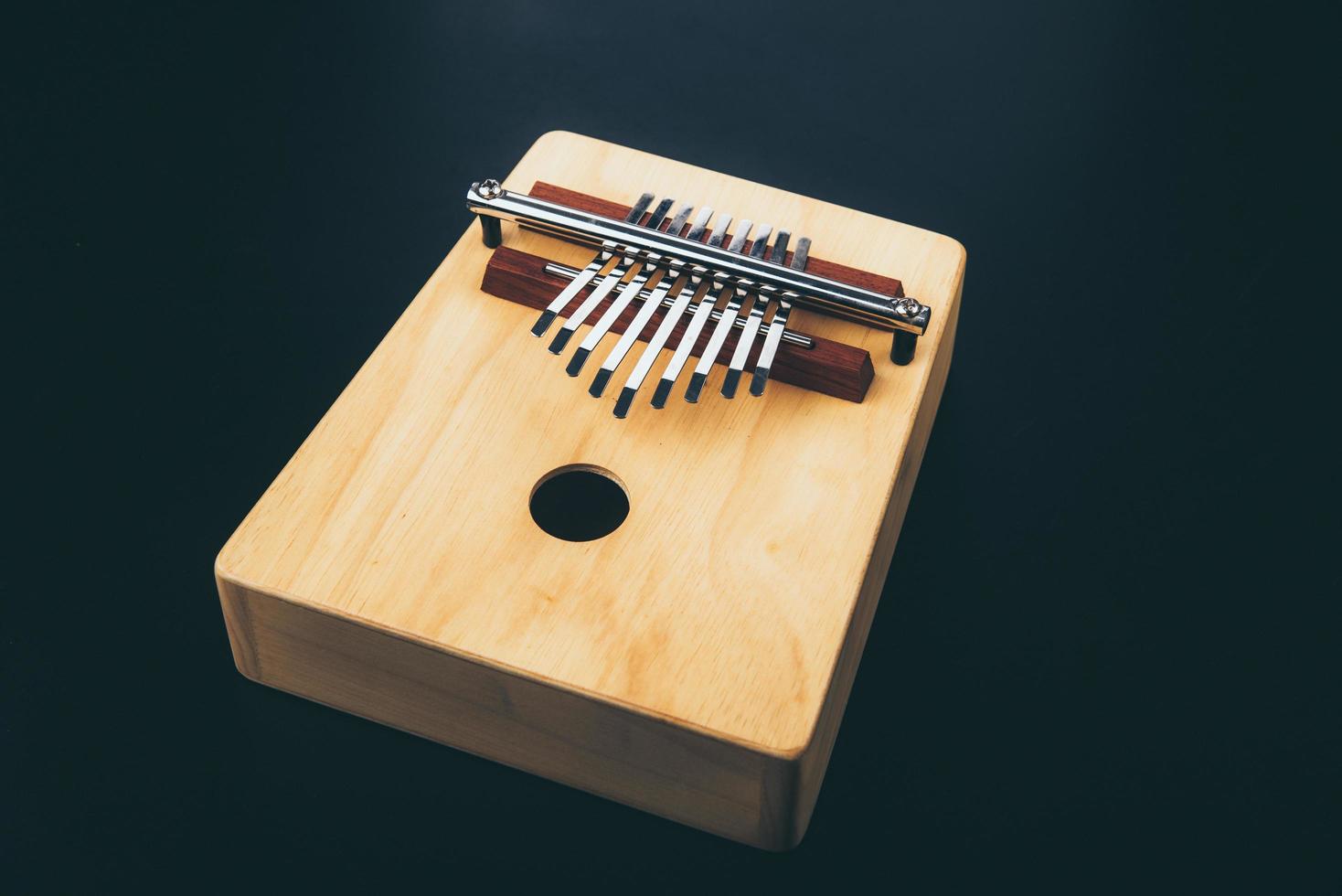 Kalimba on a black background photo