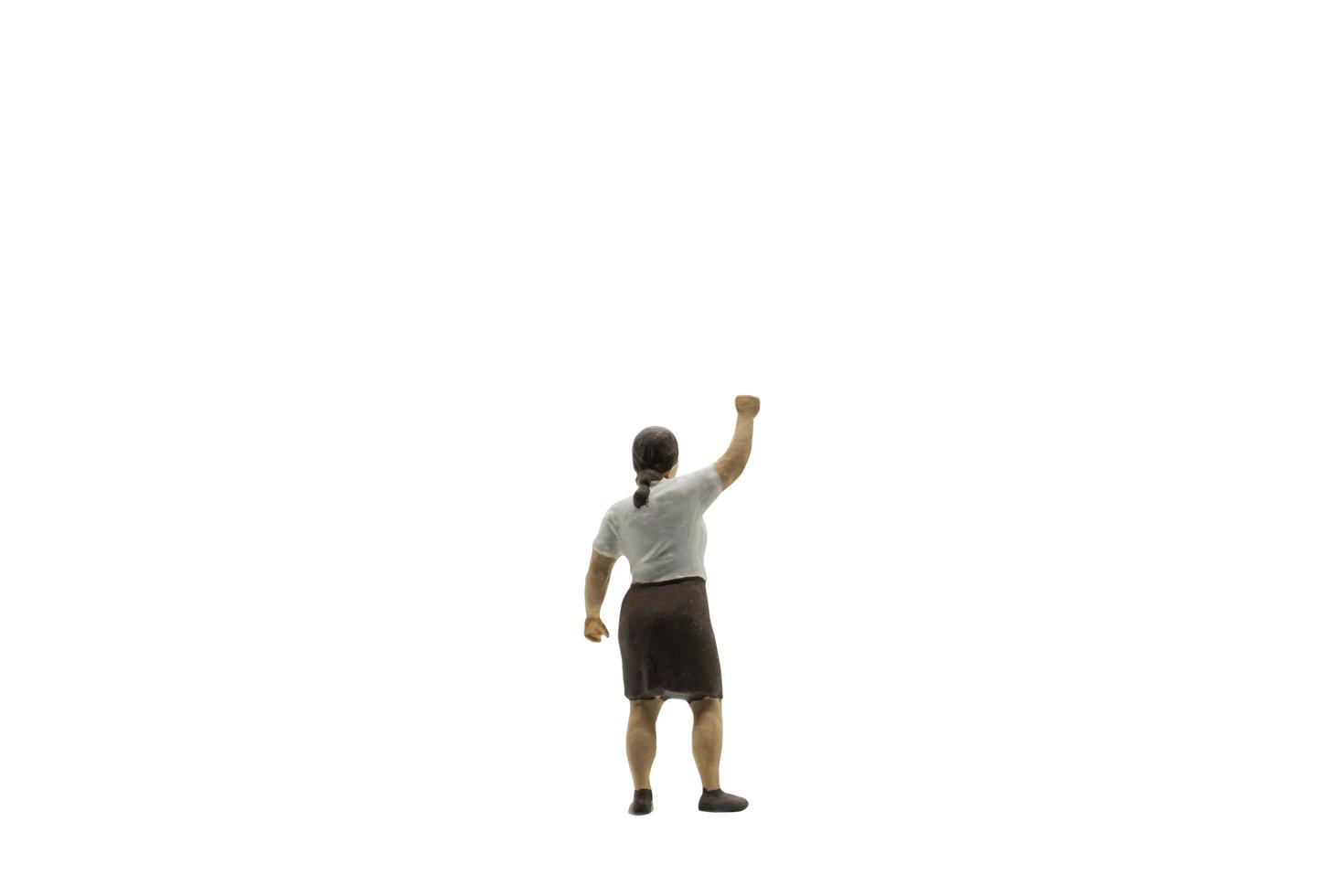 Miniature protester isolated on a white background photo