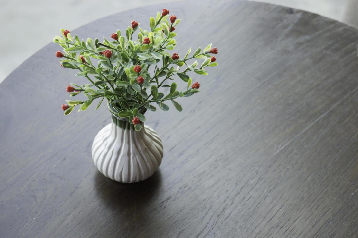 Artificial flowers on a table photo