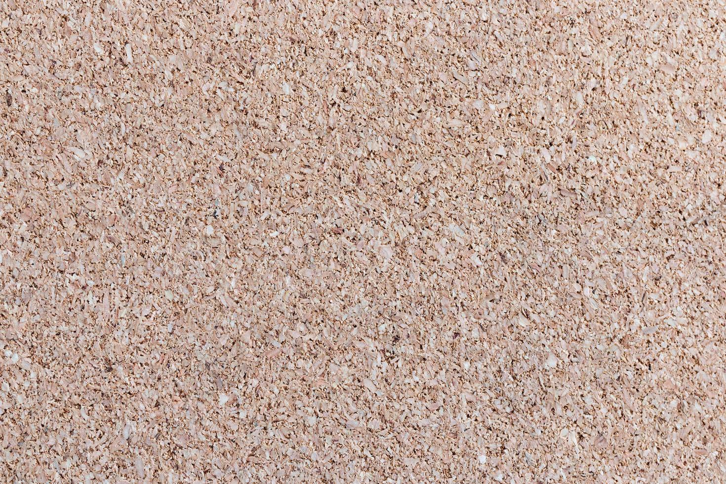 Corkboard texture background, recycled compressed wood surface photo