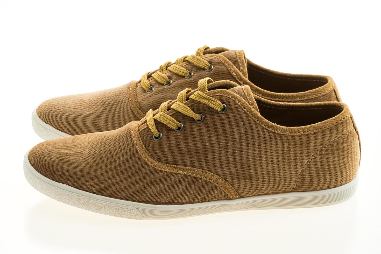 Brown leather shoes on white background photo