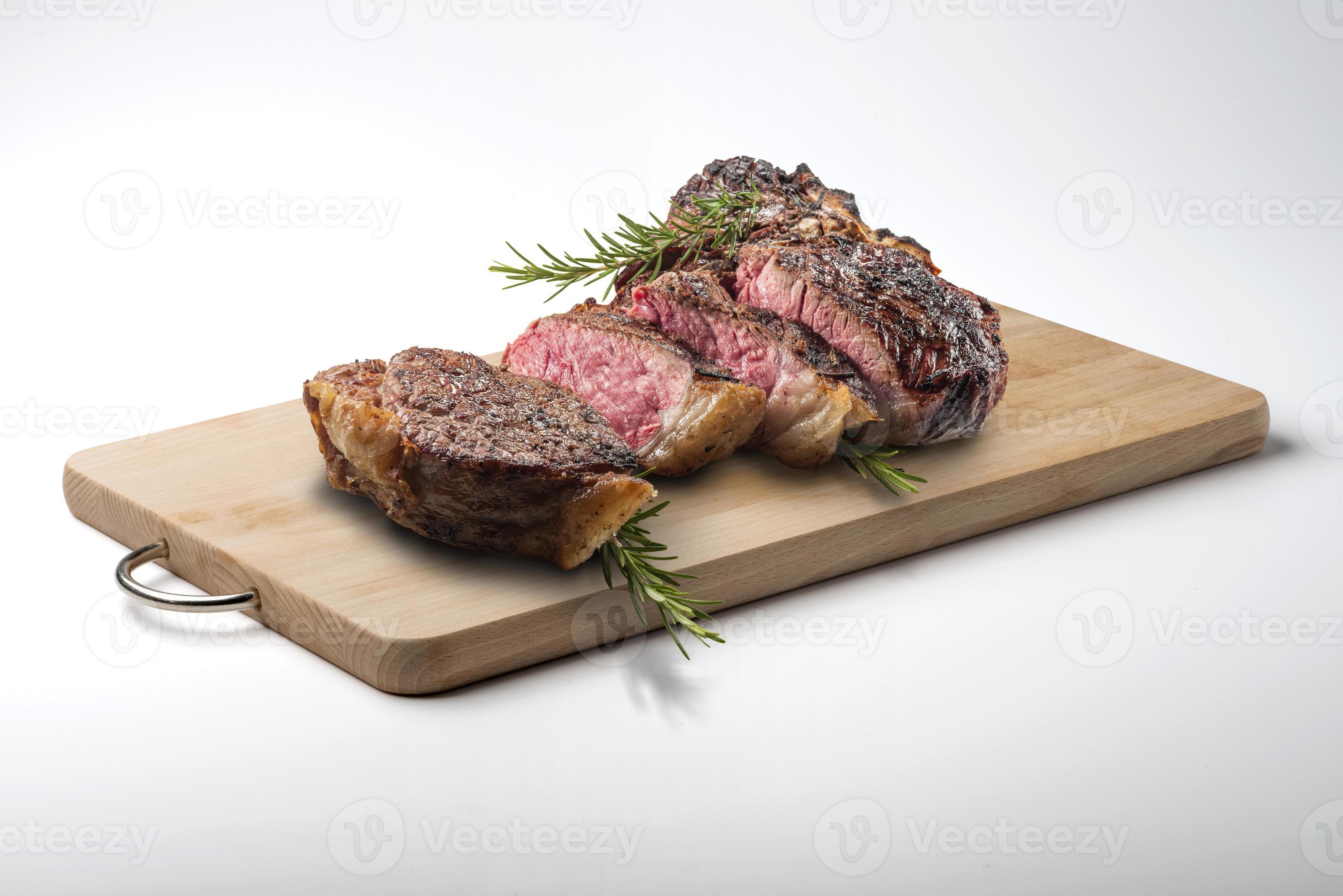 Fiorentina Tbone Steak Cut On Rectangular Wooden Chopping Board
