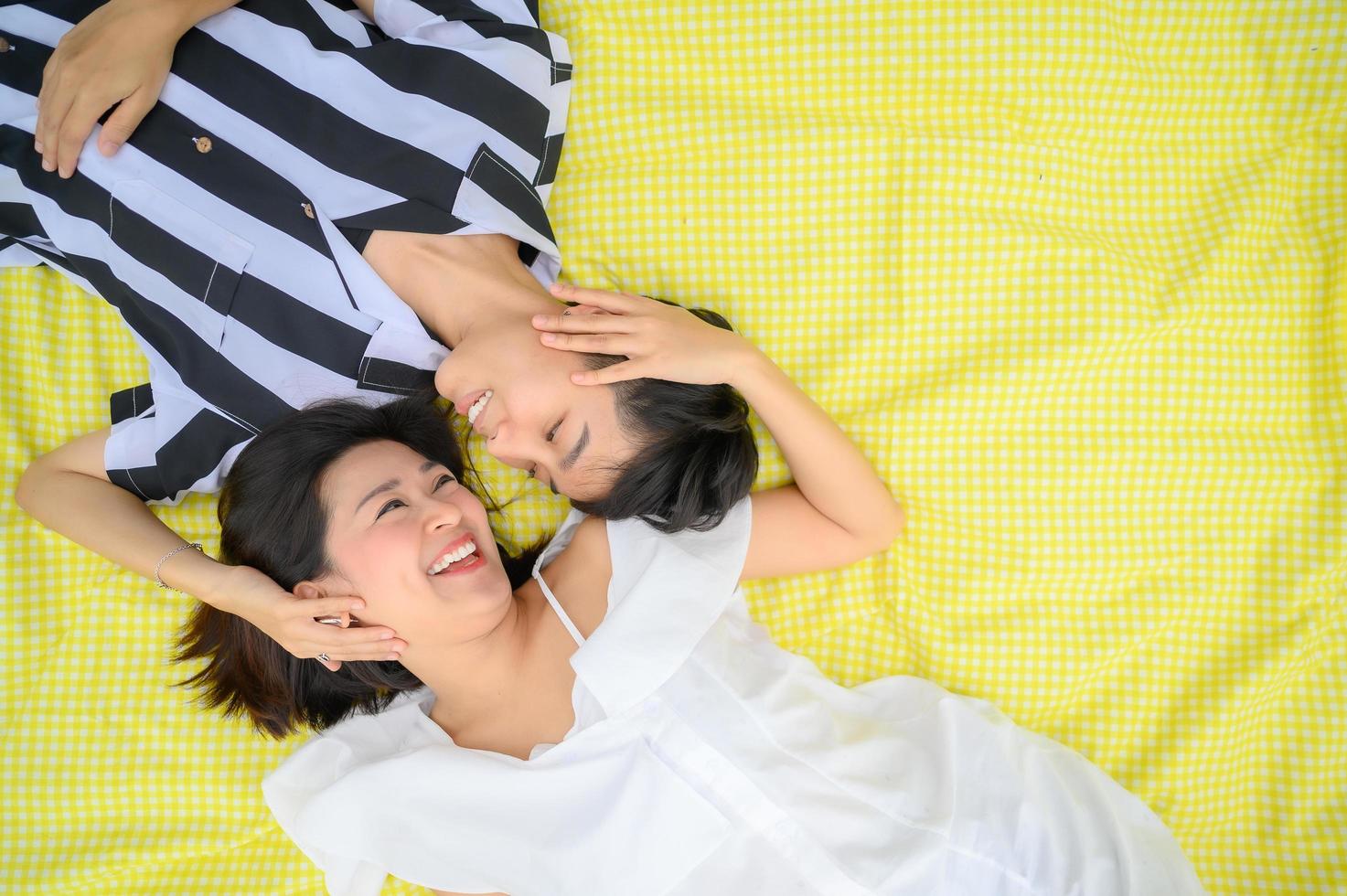 Top view of happy Asian LGBT couple photo