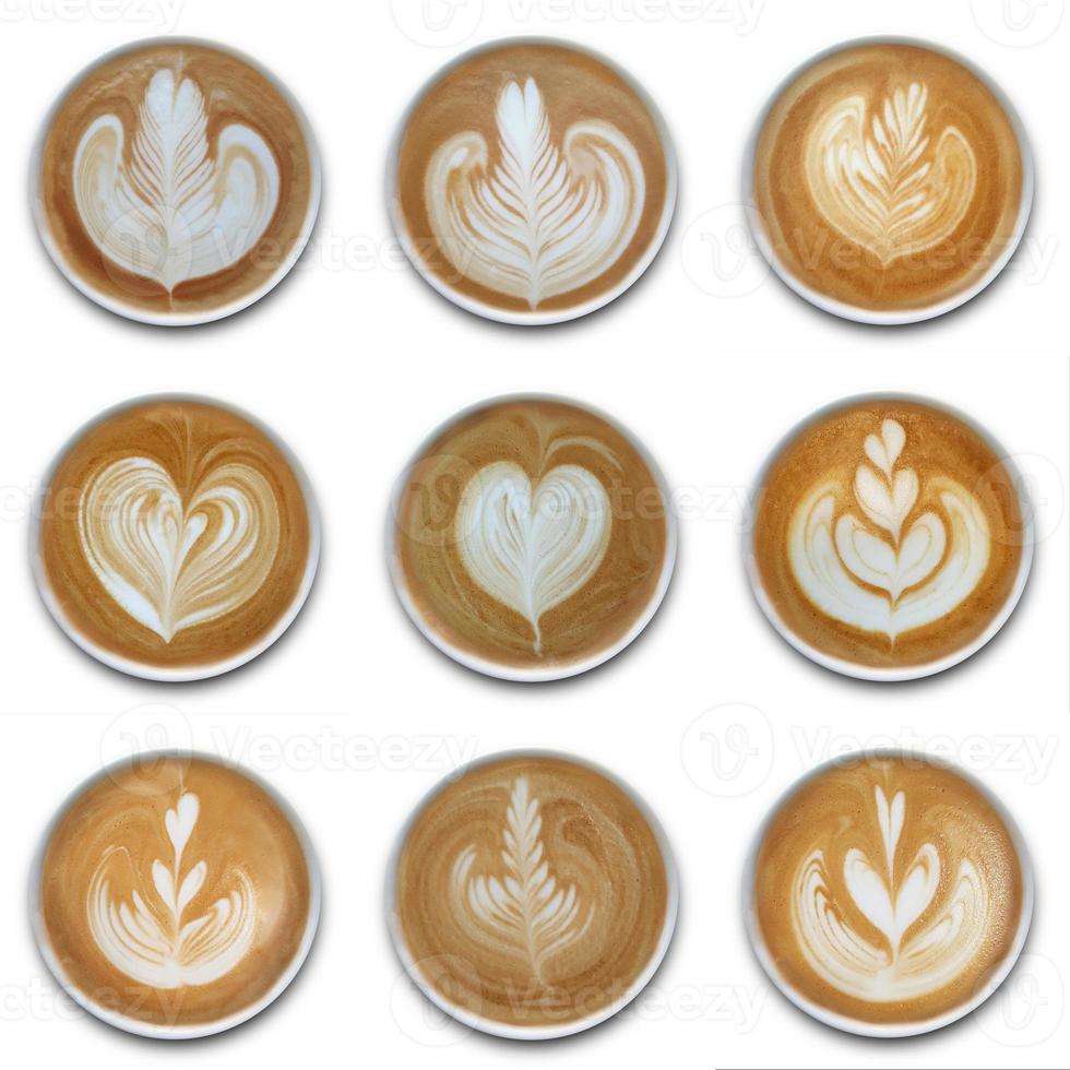 Collection of mugs of latte art coffee on white background photo