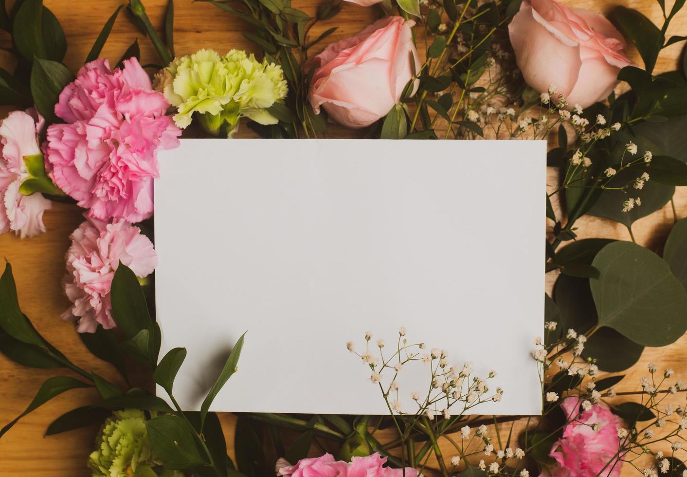 Empty card on flowers photo