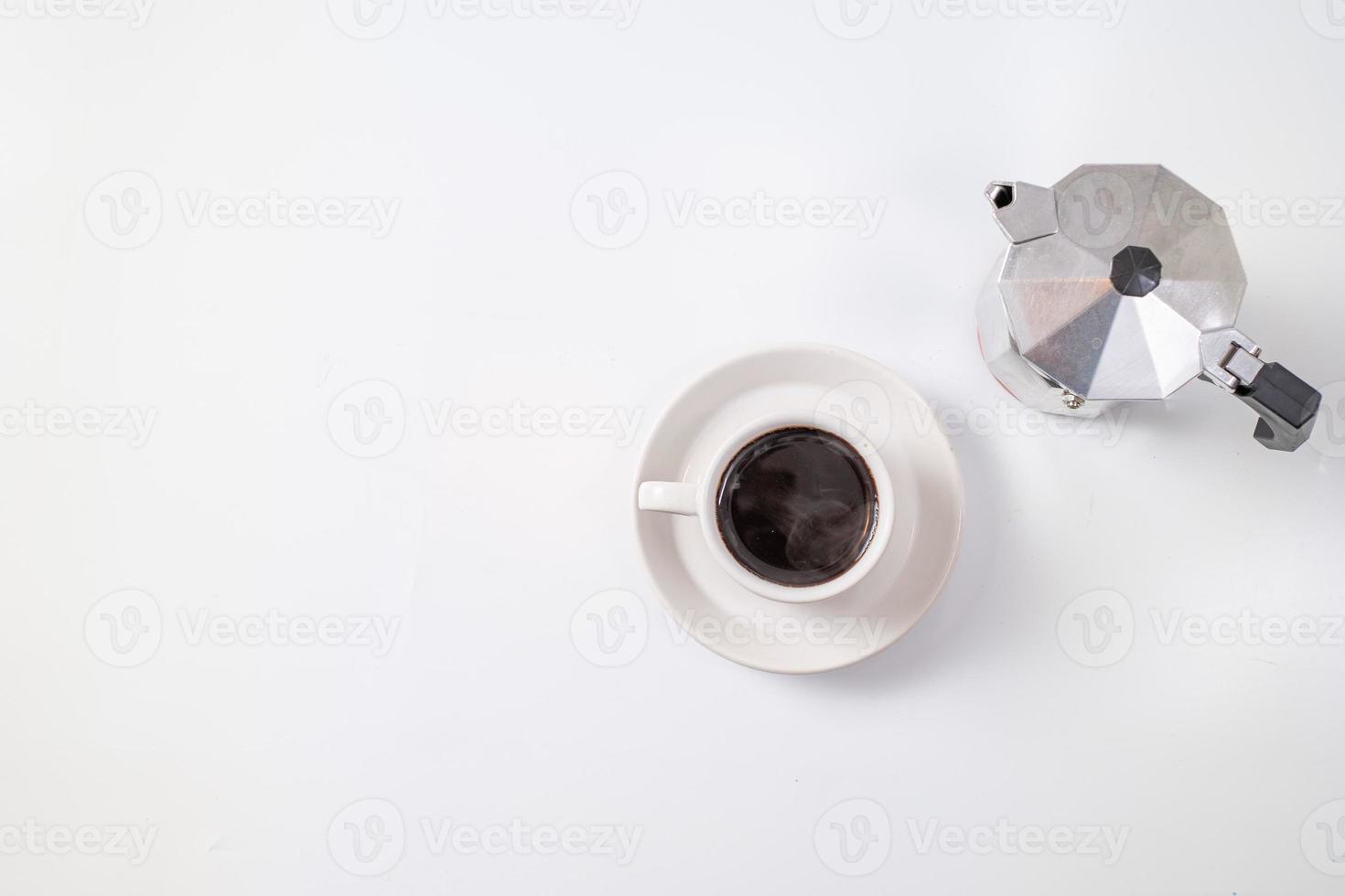 Overhead view of coffee on white background photo