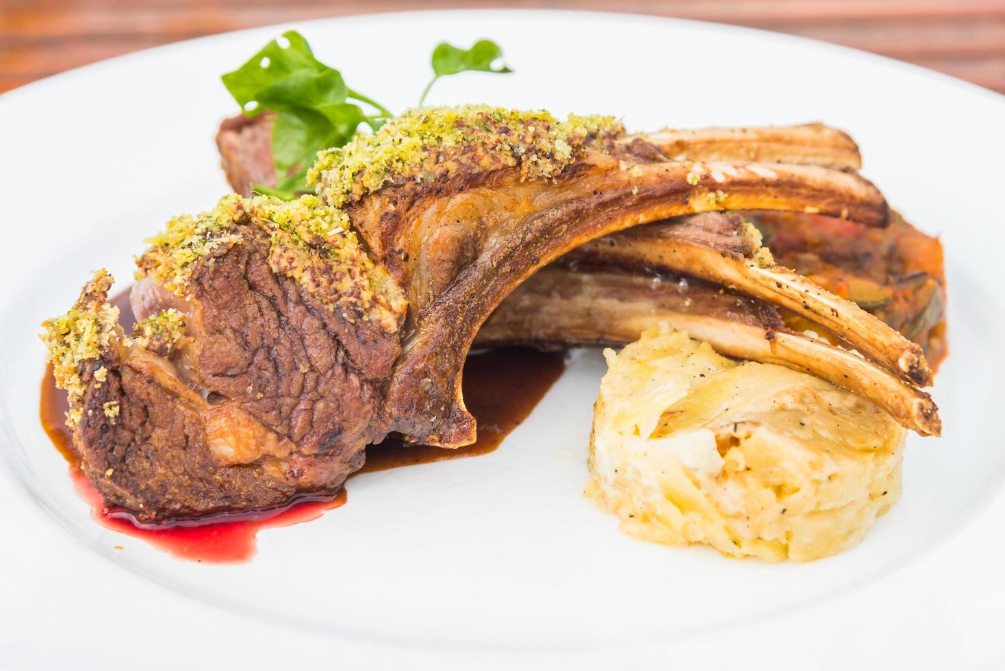 Lamb barbecue steak on white plate photo