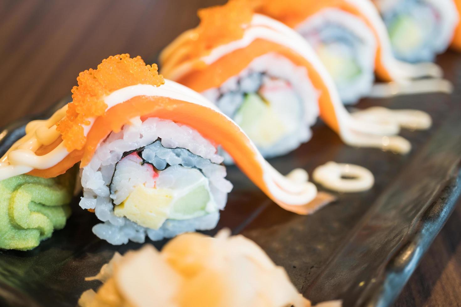 Salmon sushi roll, traditional Japanese food photo