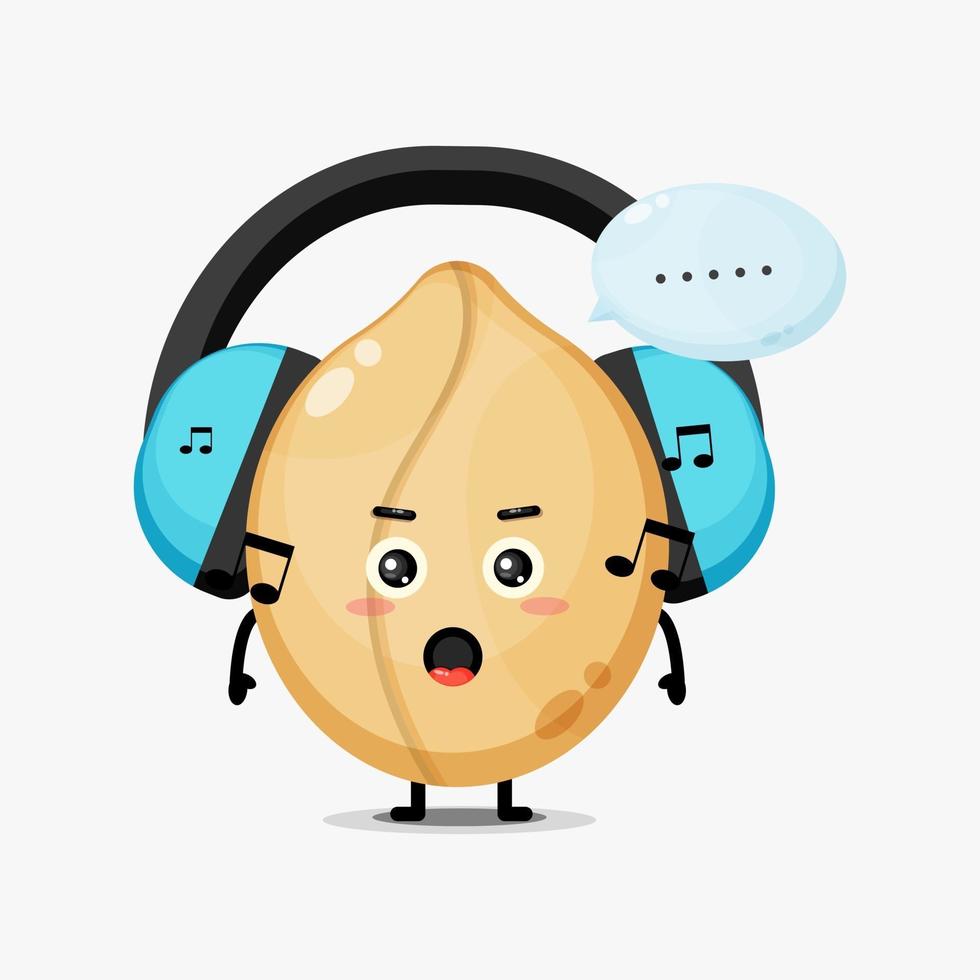 Cute peanut mascot listening to music vector