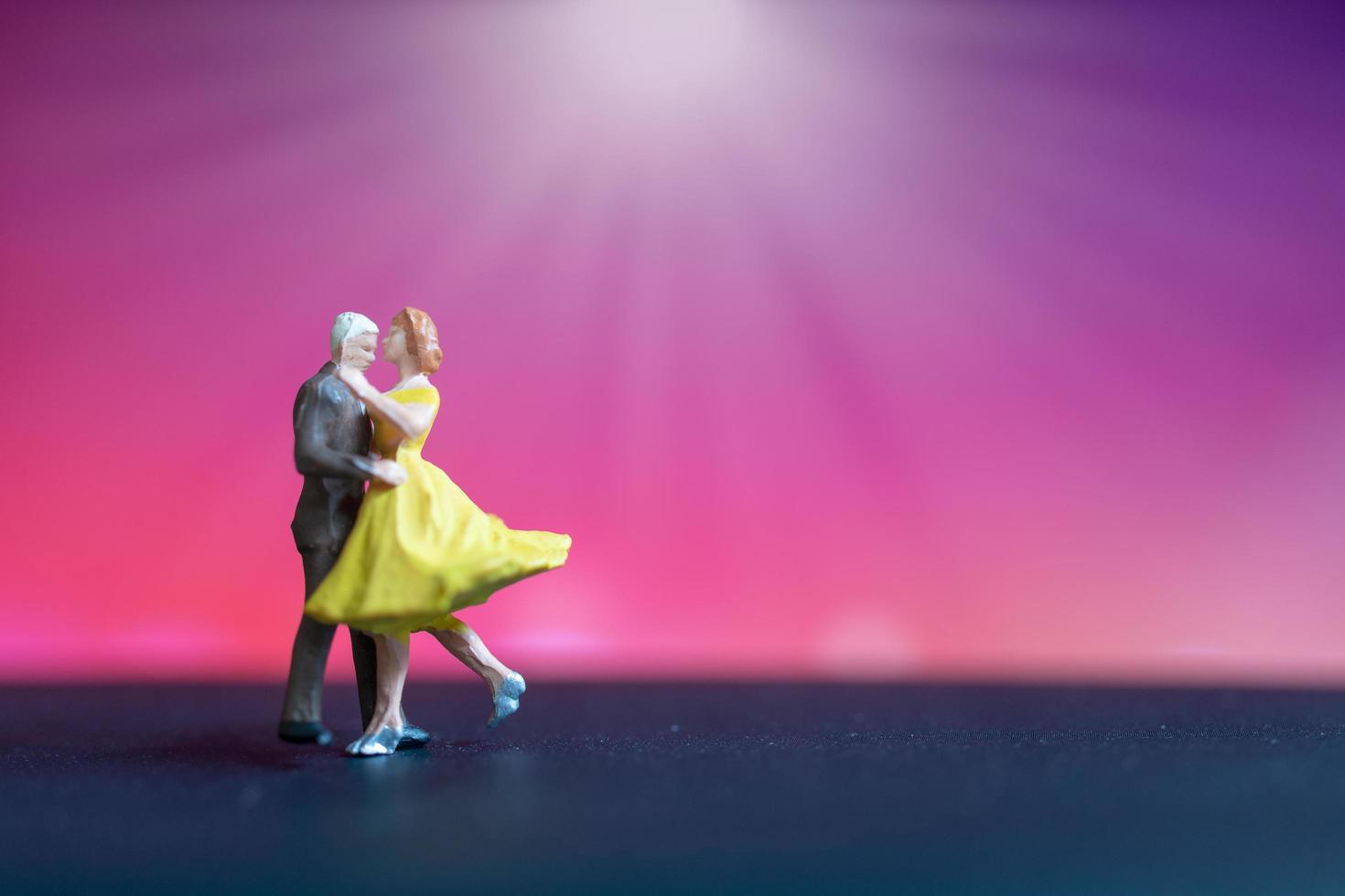 Miniature couple dancing with a colorful bokeh background 2149353 Stock ...