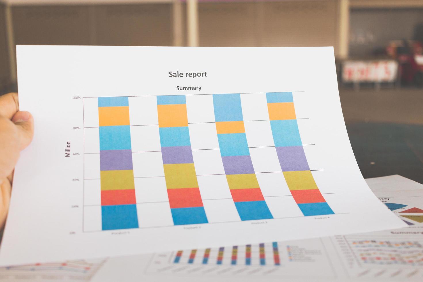 Financial graphs and charts on a wooden table photo